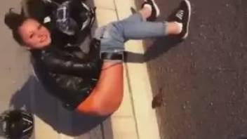 Biker girl shit on the street